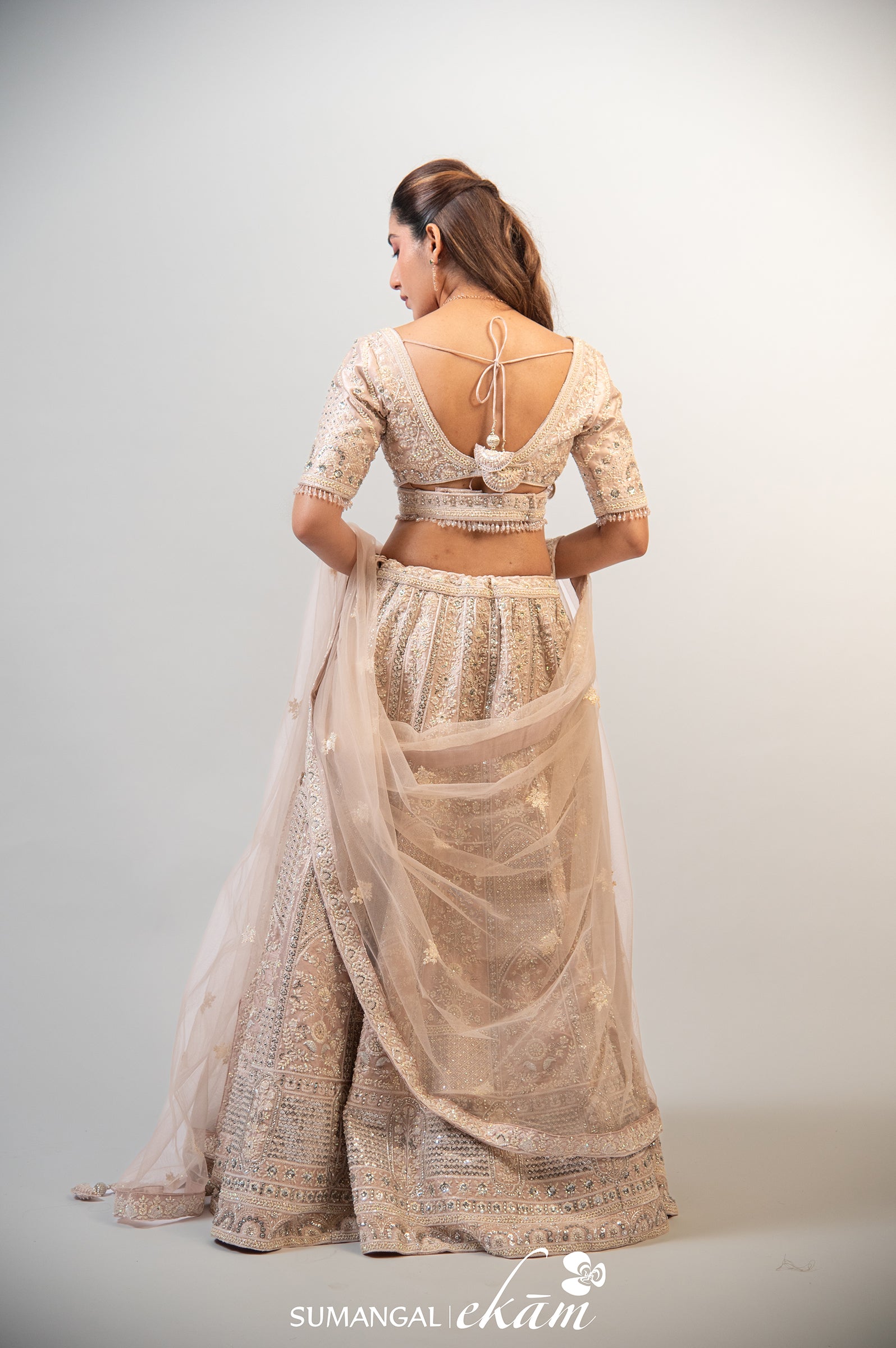 Designer Peach Net Handwork Lehenga